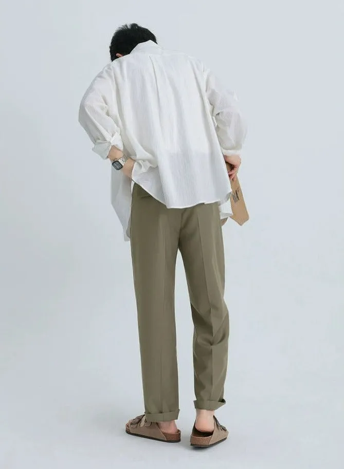 Relaxed Tapered Pleated Trousers with Pockets