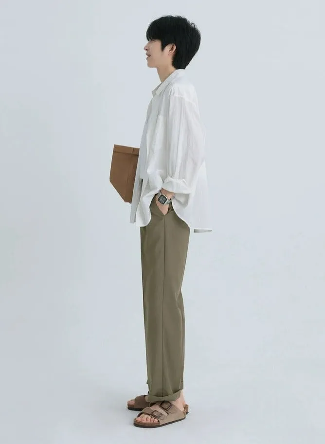 Relaxed Tapered Pleated Trousers with Pockets